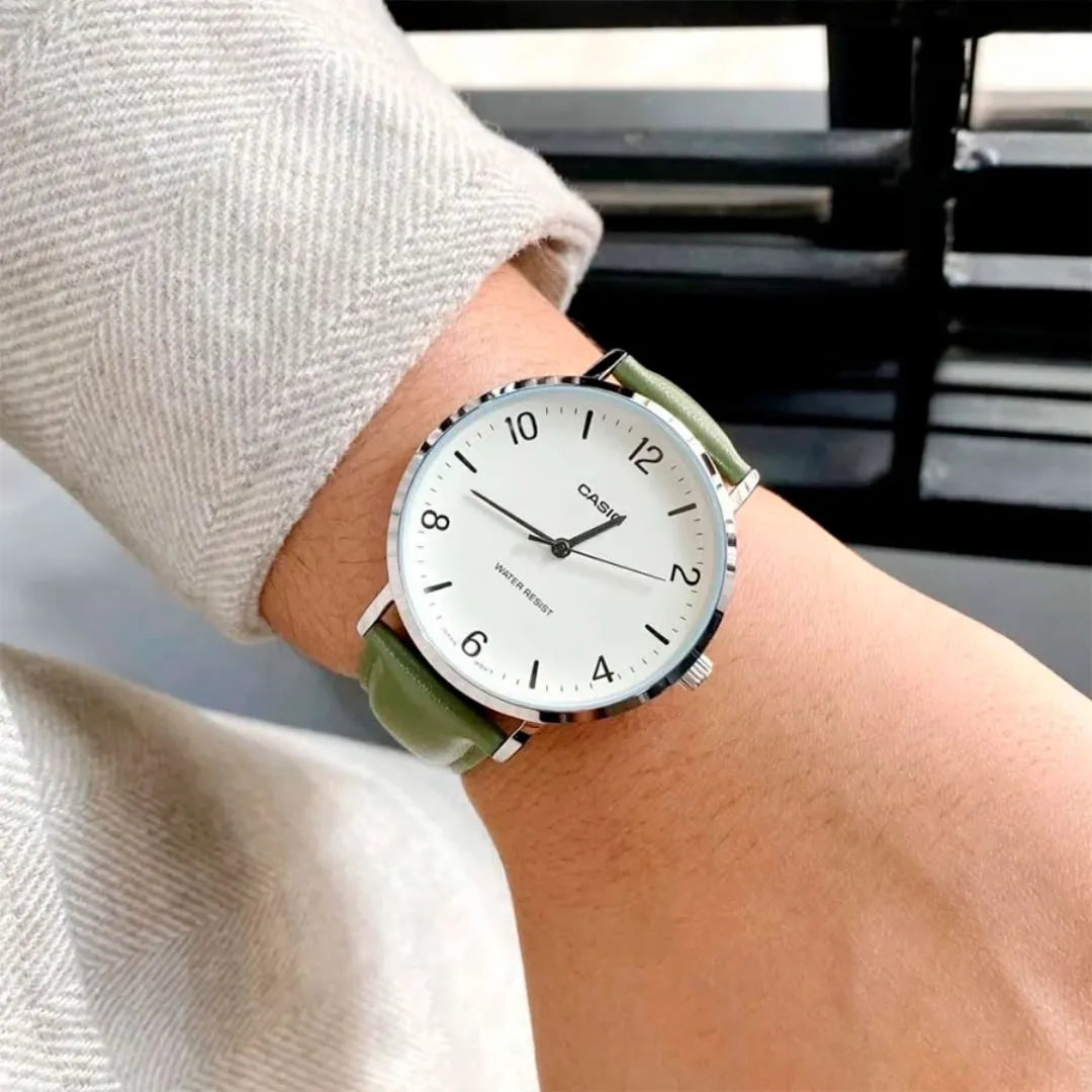 Casio MTP-VT03L-7B — watch worn with a light sleeve.